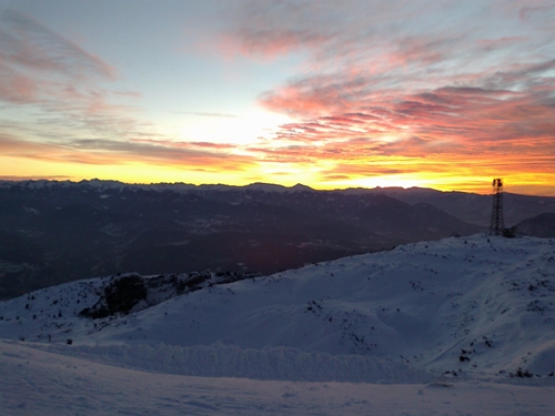 Alba sulla cima della Paganella